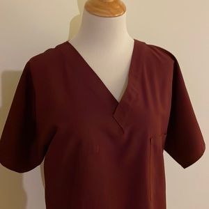 Women’s Landau burgundy scrub set.